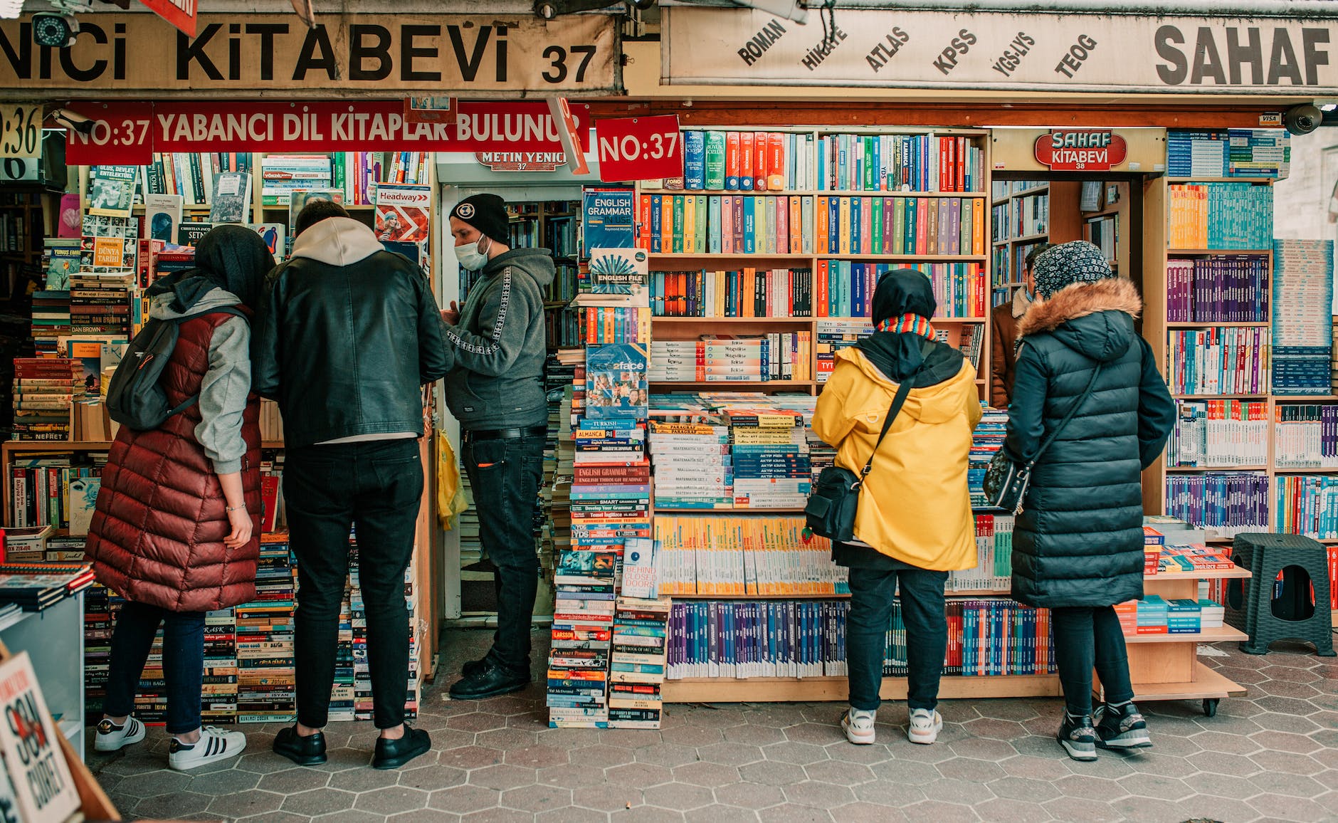 pexels-photo-7542095 - The Paris Post Free Book Promotion group of people choosing books