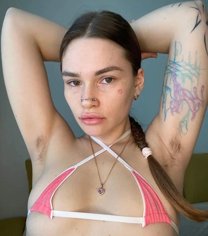 hairy-armpit-from-instagram - The Paris Post Pink bikini model exposing both of her armpits