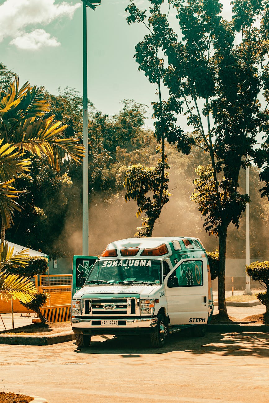 pexels-photo-3584099 - The Paris Post Importance of Golden Hour During Road Accidents | photo of ambulance parked near trees