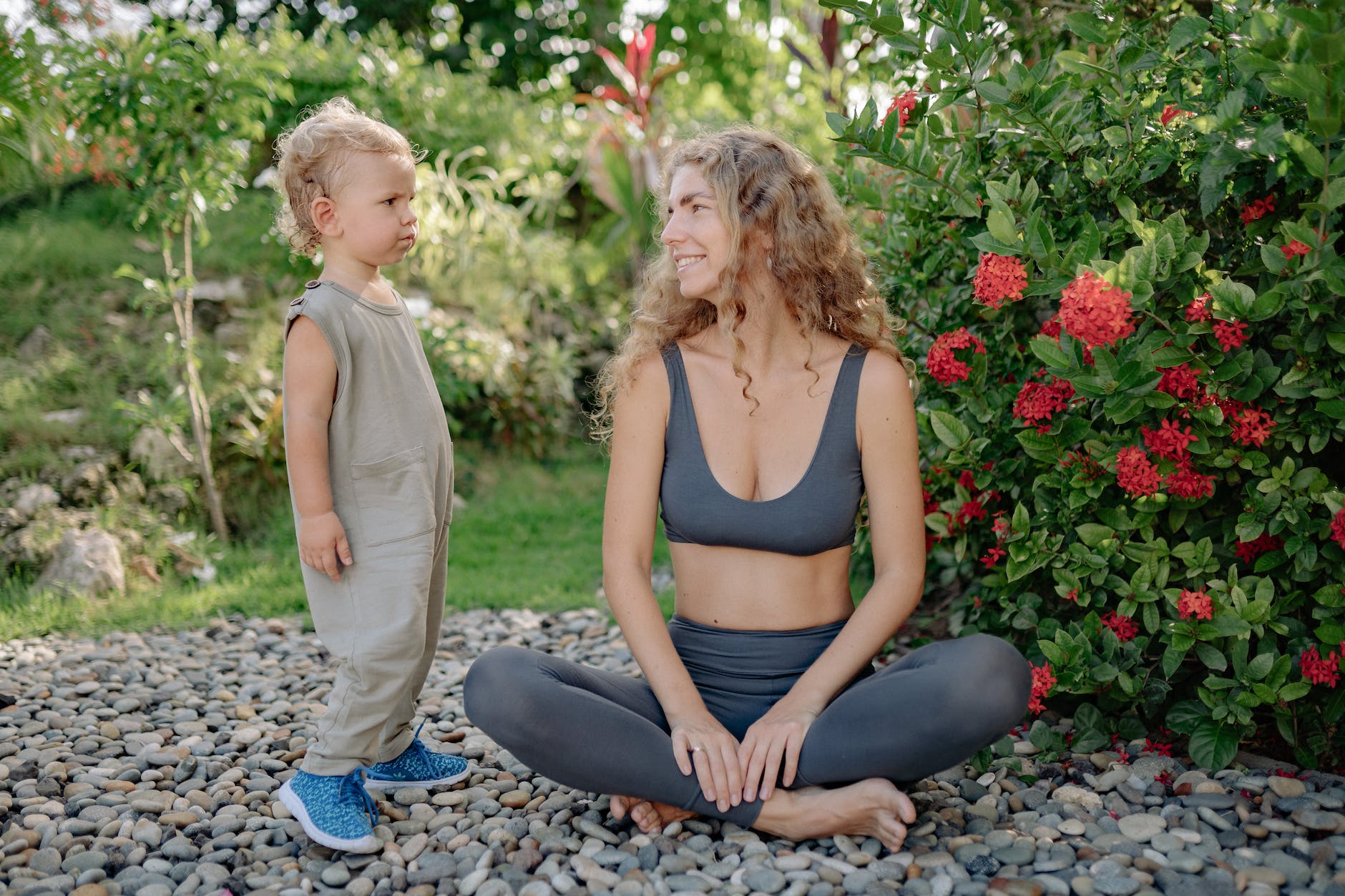 pexels-photo-4458024 - The Paris Post 5 Yoga poses for moms to be not to avoid: Ultimate guide in details | mother with charming child practicing yoga in bright garden