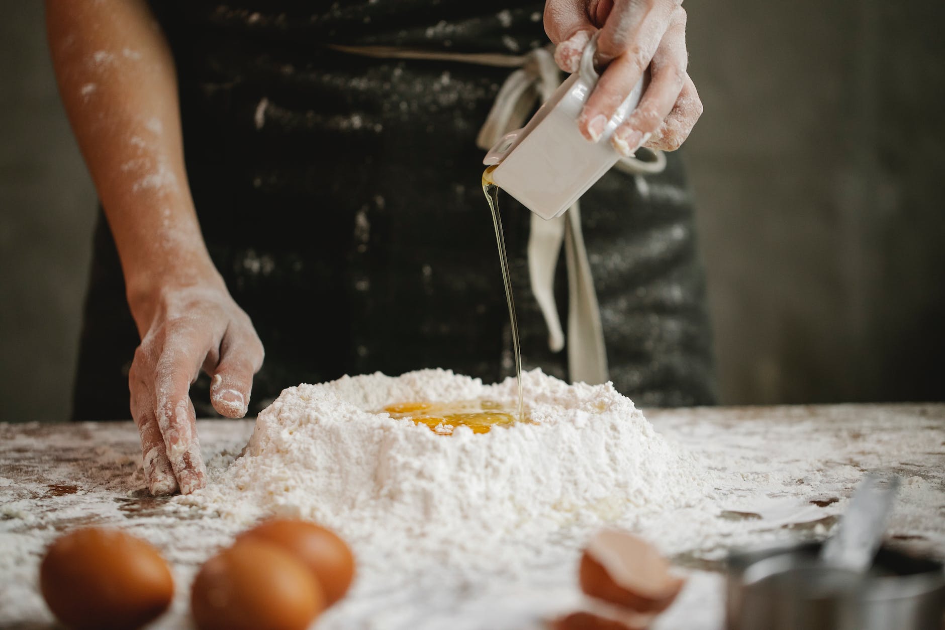 pexels-photo-6287251 - The Paris Post chef preparing dough for cooking in kitchen