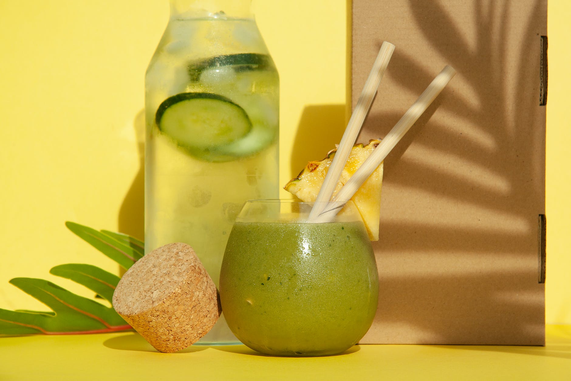 green juice smoothie in a drinking glass