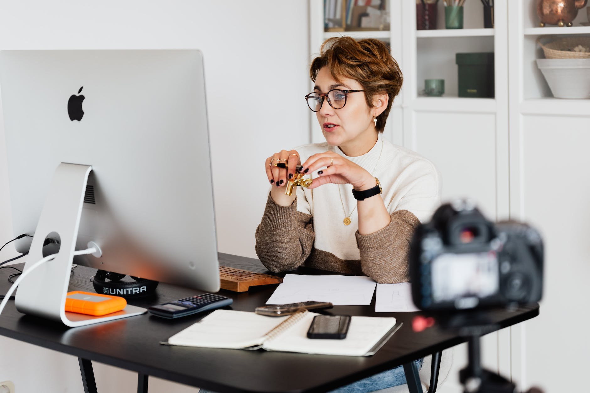 pexels-photo-4491461 confident elegant lady in eyeglasses hosting | Author Press Release: Simple guidelines for new book authors webinar