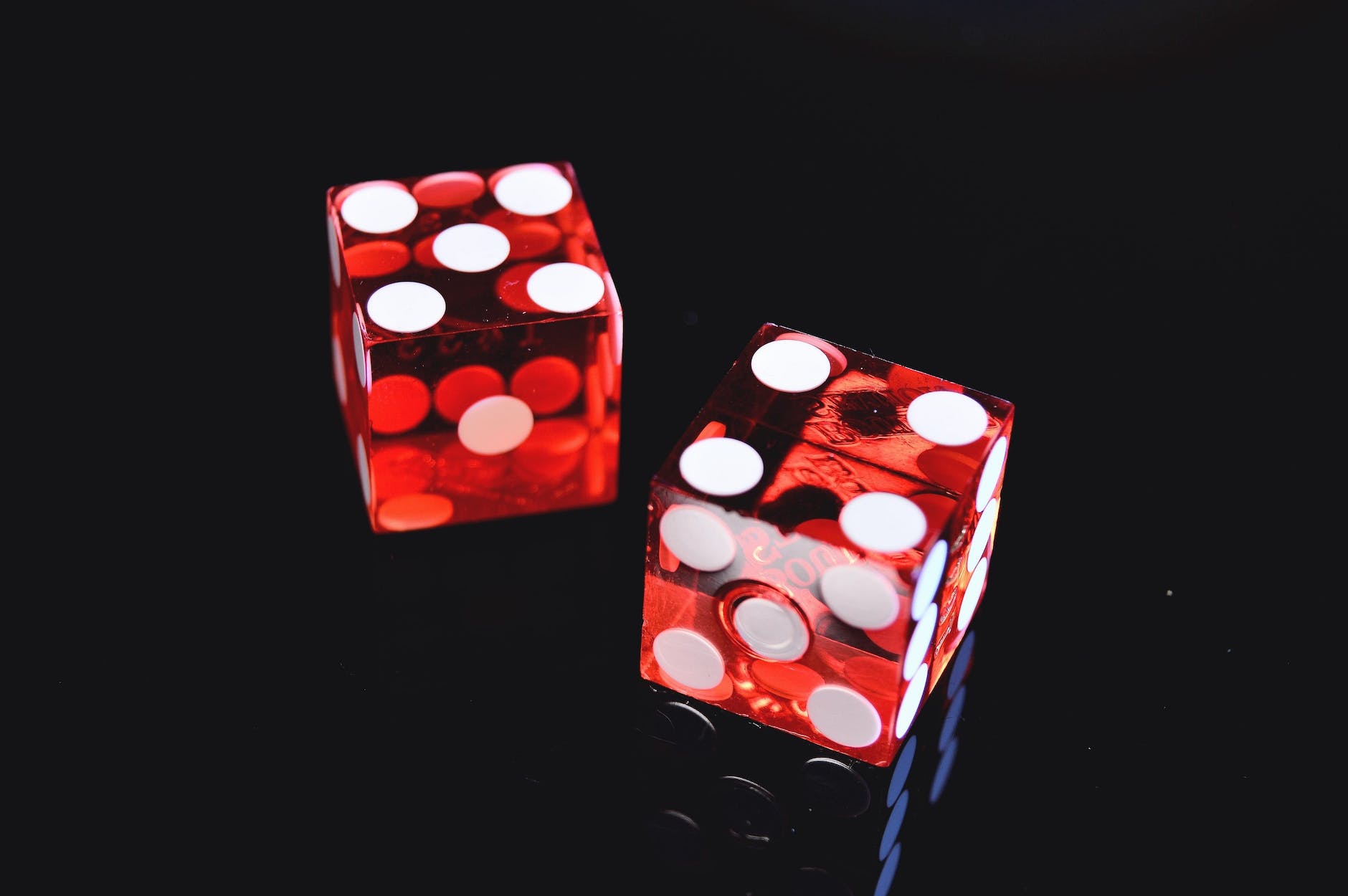 pexels-photo-965879 - The Paris Post photo of two red dices : Casino guest post guidelines, ideas and sites in 2023: All about Play casino games for beginners