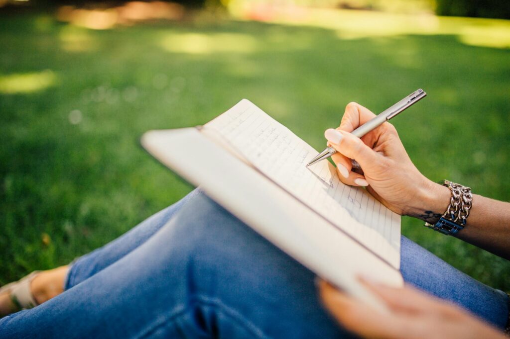 fashion woman notebook pen: Got questions about diary writing? Find answers to common FAQs for students or working professionals, covering what to write, and journaling benefits.