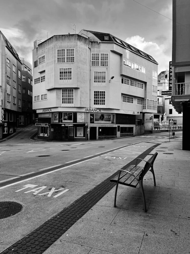 deserted urban street with architecture: Confronting the "Silent Spectator Syndrome" in a World Demanding Action.