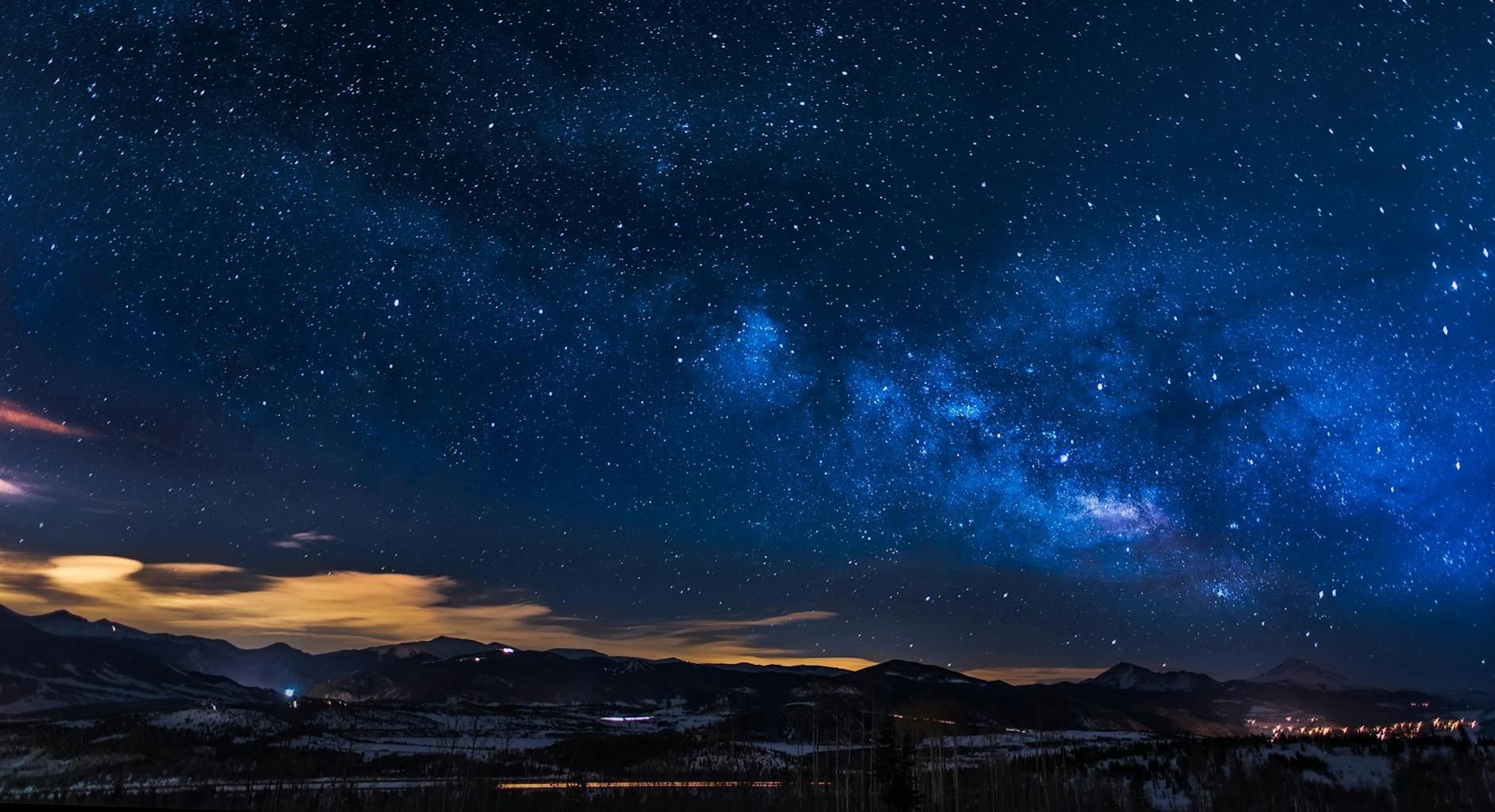 black mountains under the stars at nighttime: A soulful reflection on how every being follows a unique journey in life. Embrace differences and trust the timing of your own path.
