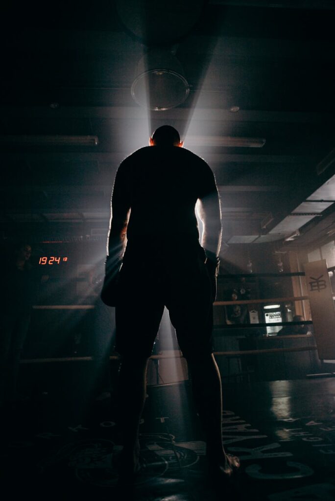 man in black shirt and pants standing on the floor: a thoughtful, poetic, and somewhat philosophical reflection on the need for systemic change in society, governance, and global relations.